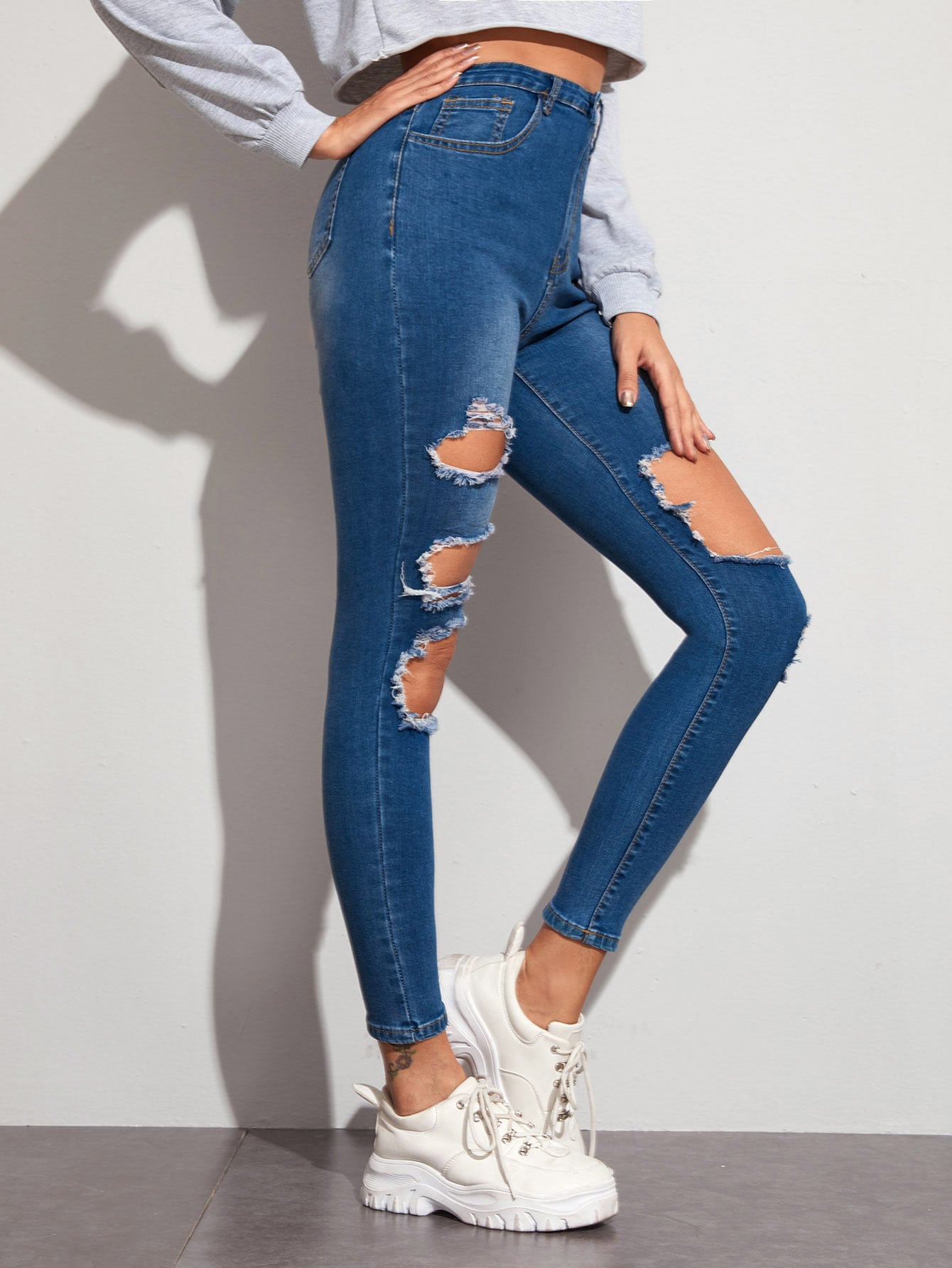 بنطلون نحيل ممزق مغسول مبيض