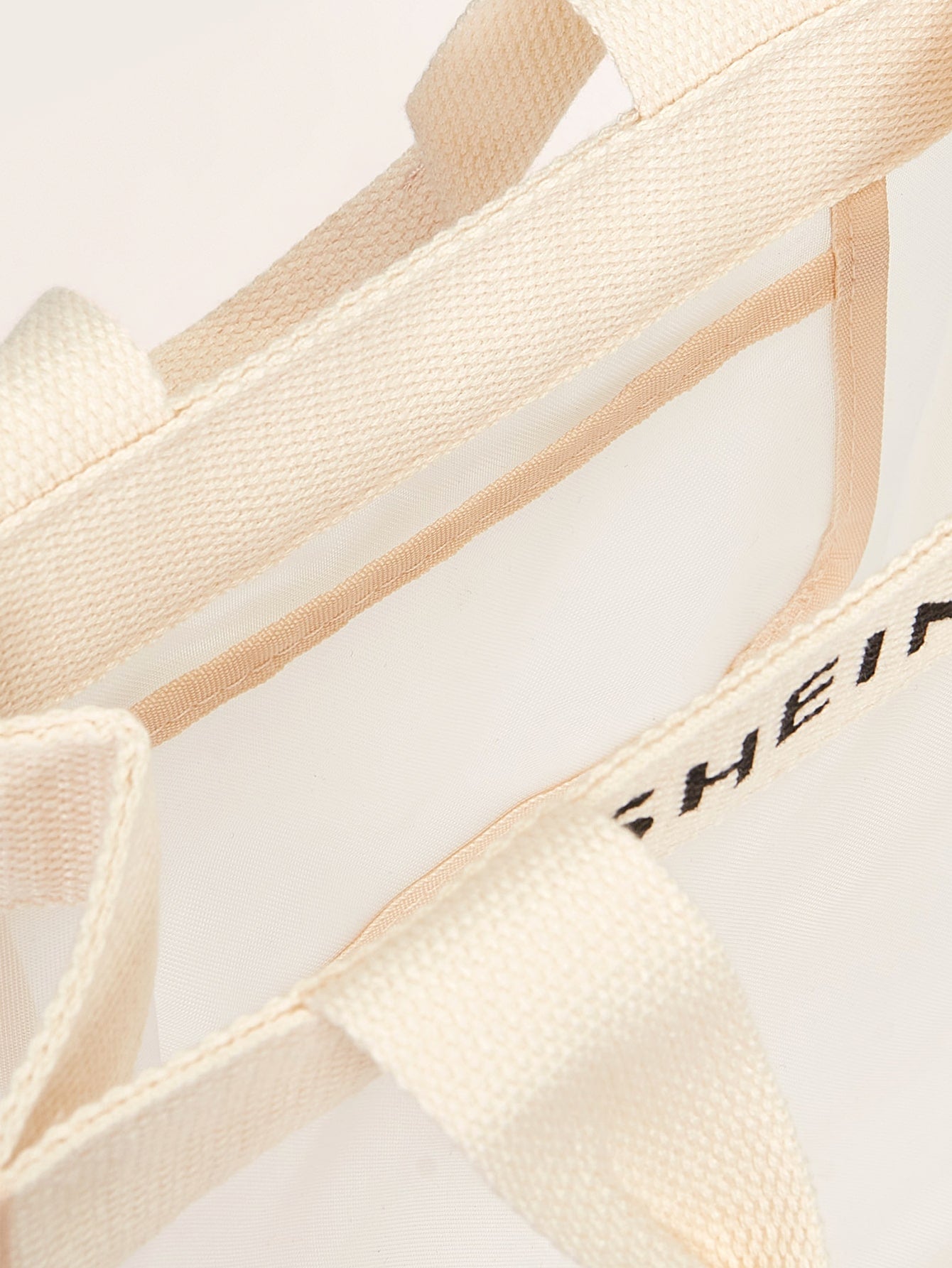 حقيبة يد شبكي بجرافيك عبارة