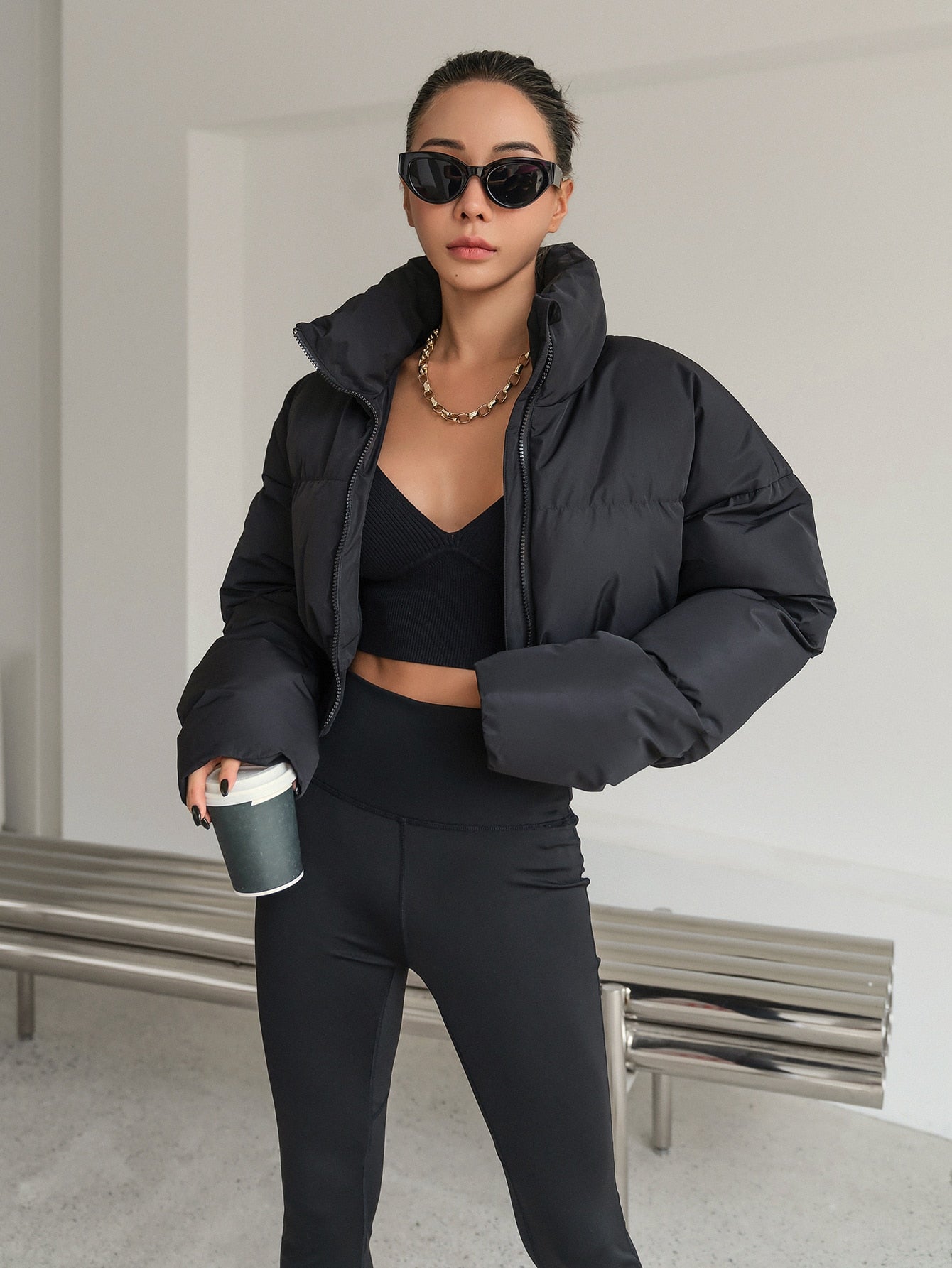 معطف سميك بأكمام منسدلة وسحاب وجيوب