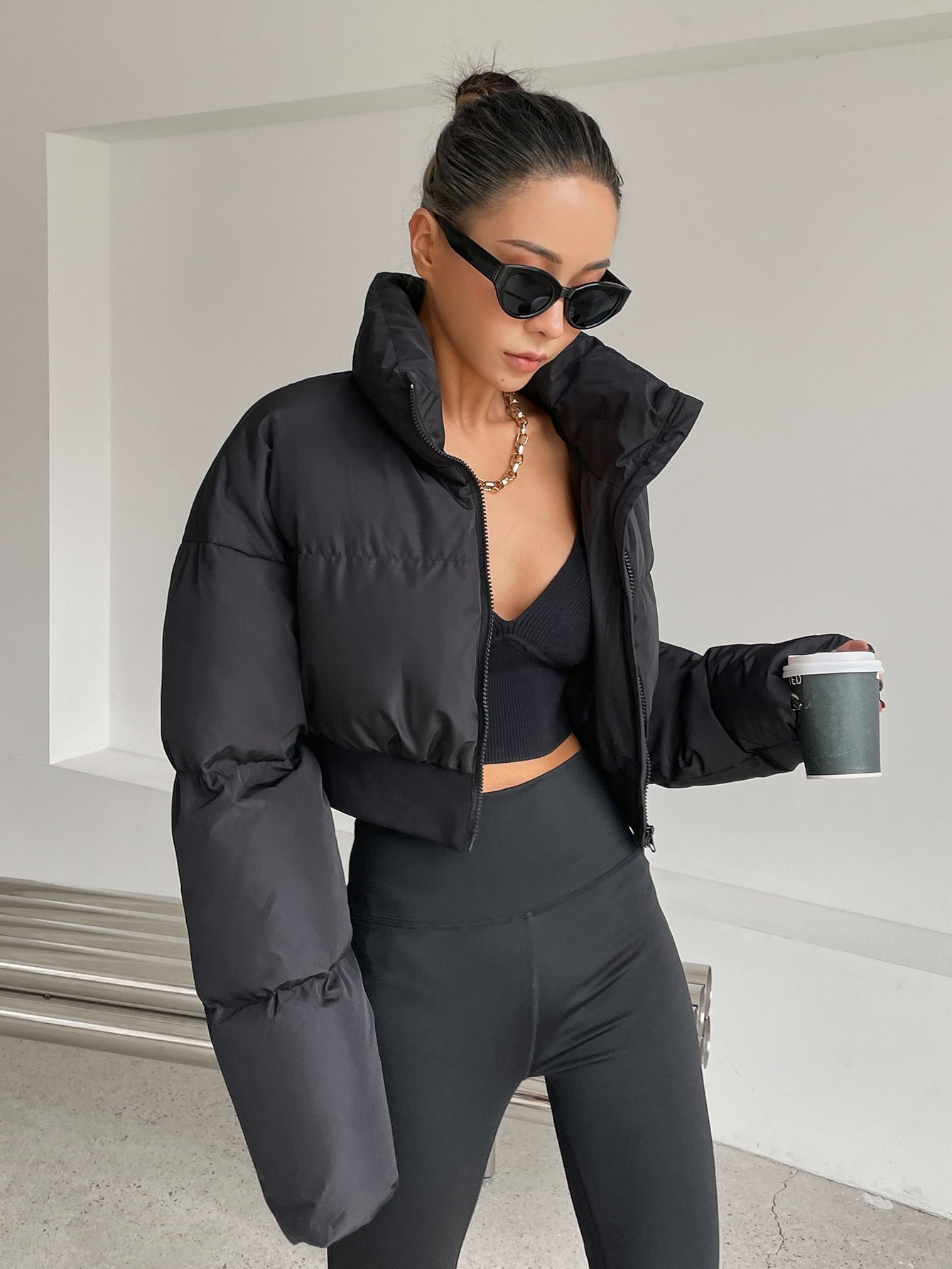 معطف سميك بأكمام منسدلة وسحاب وجيوب