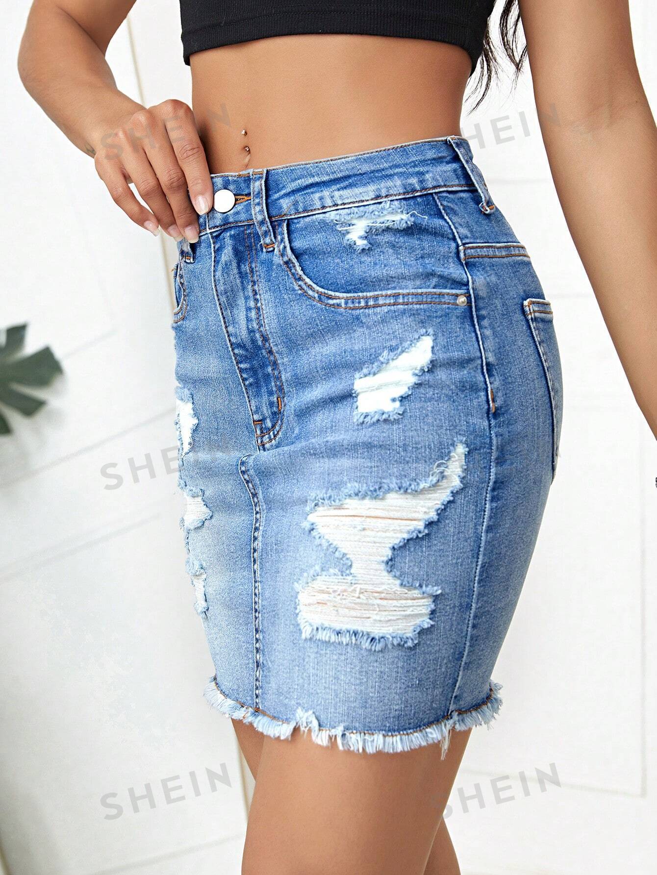 تنورة دنيم ممزق حافة خام