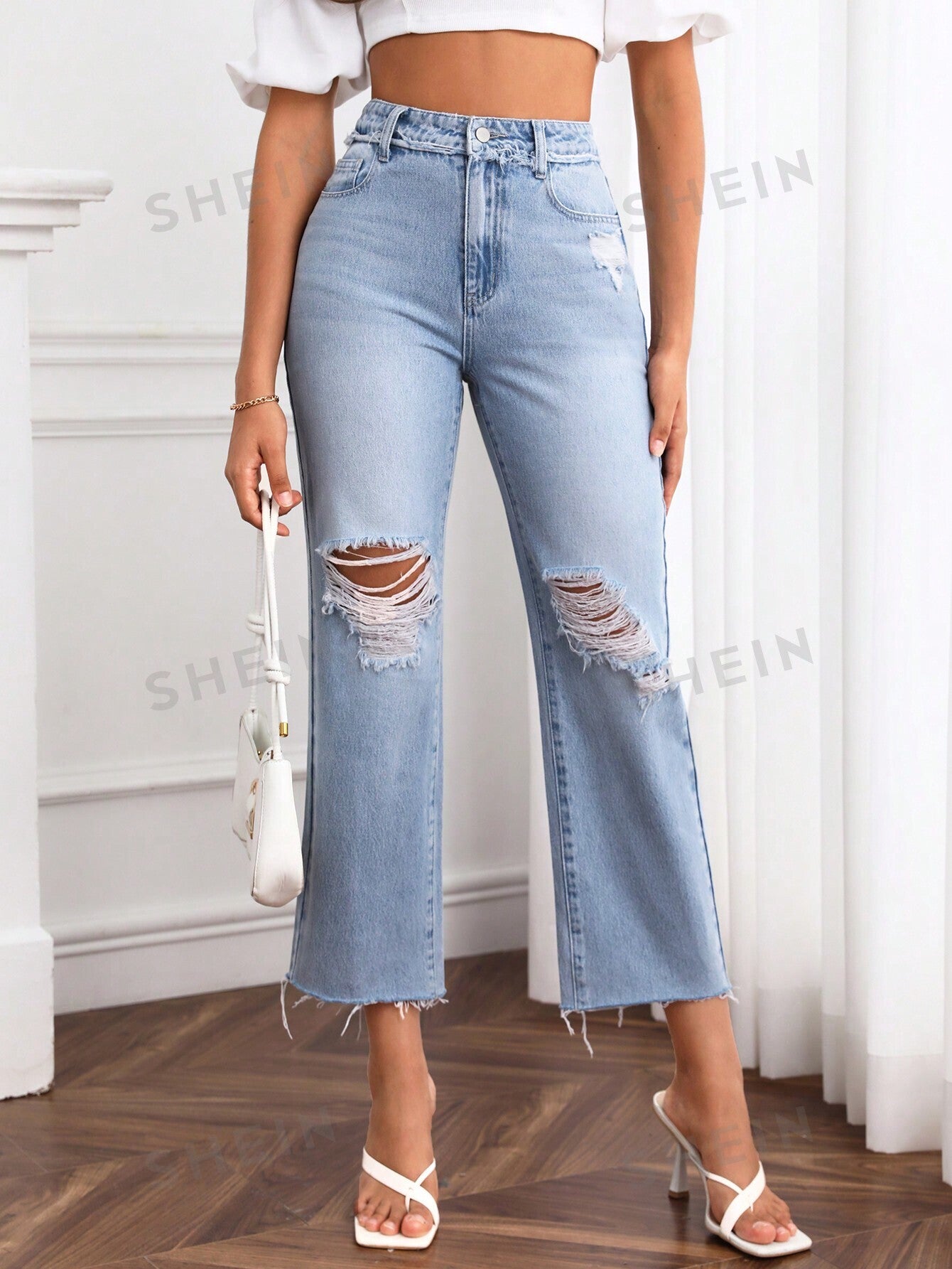 جينز بساق مستقيم حافة خام ممزق