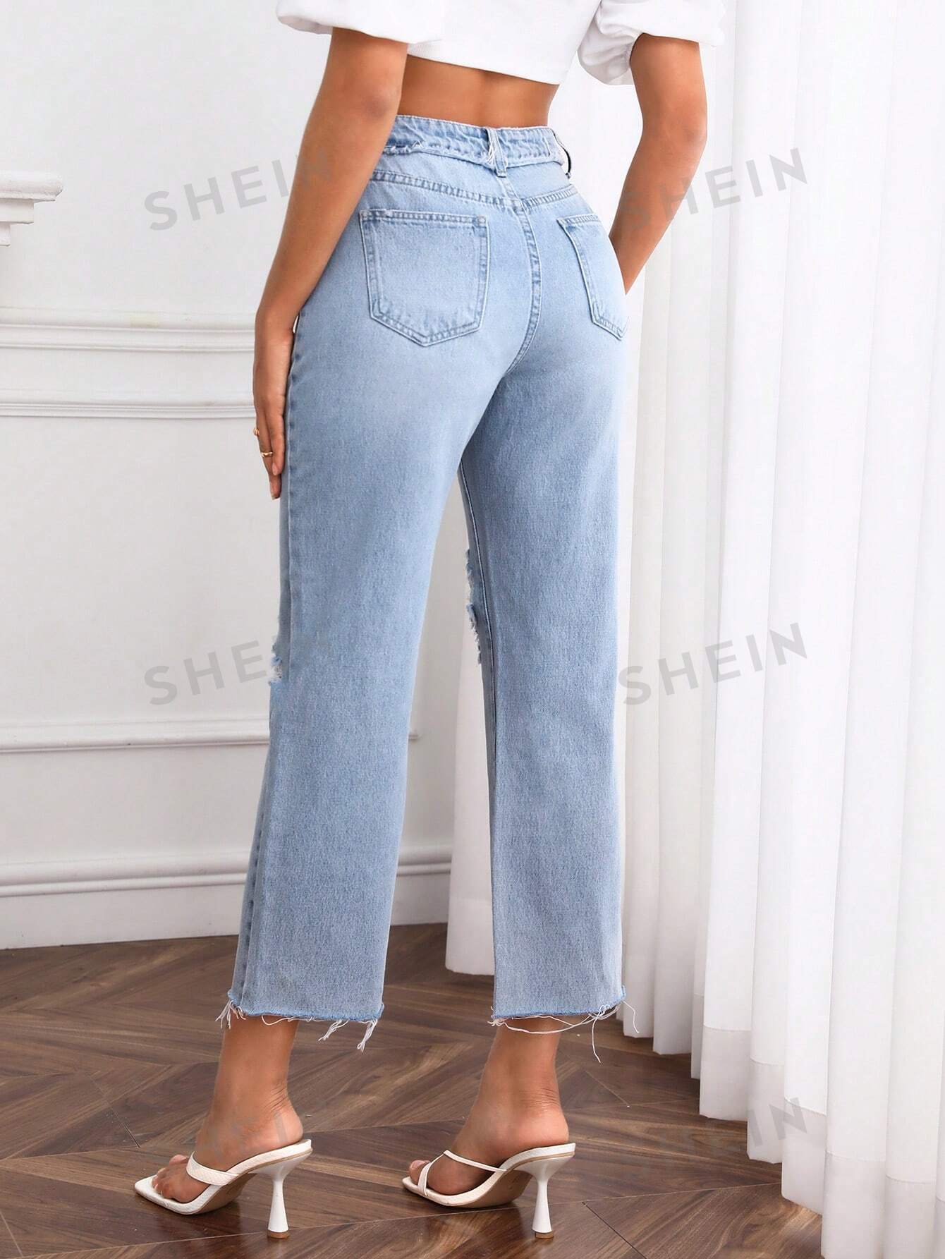 جينز بساق مستقيم حافة خام ممزق