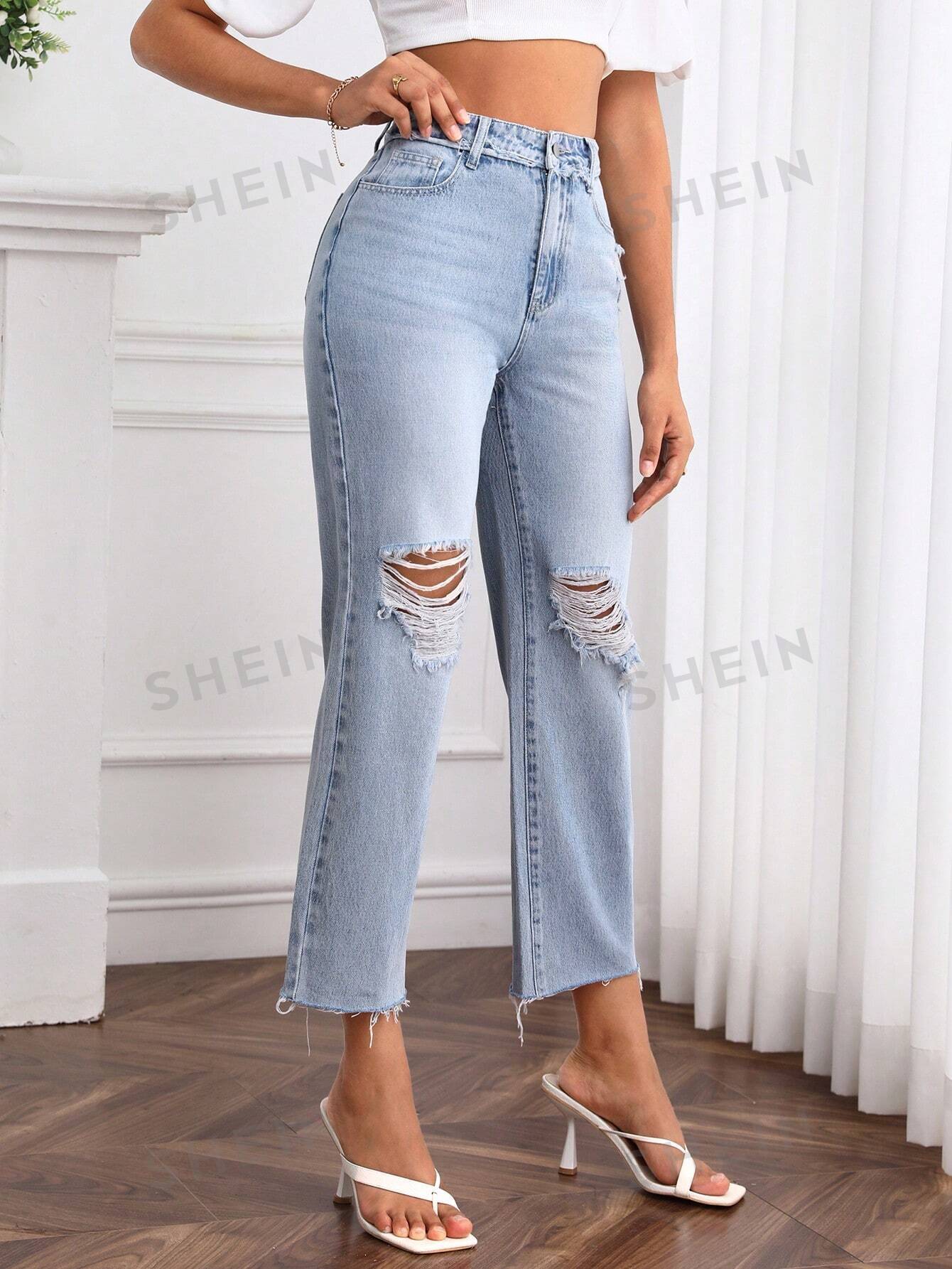 جينز بساق مستقيم حافة خام ممزق