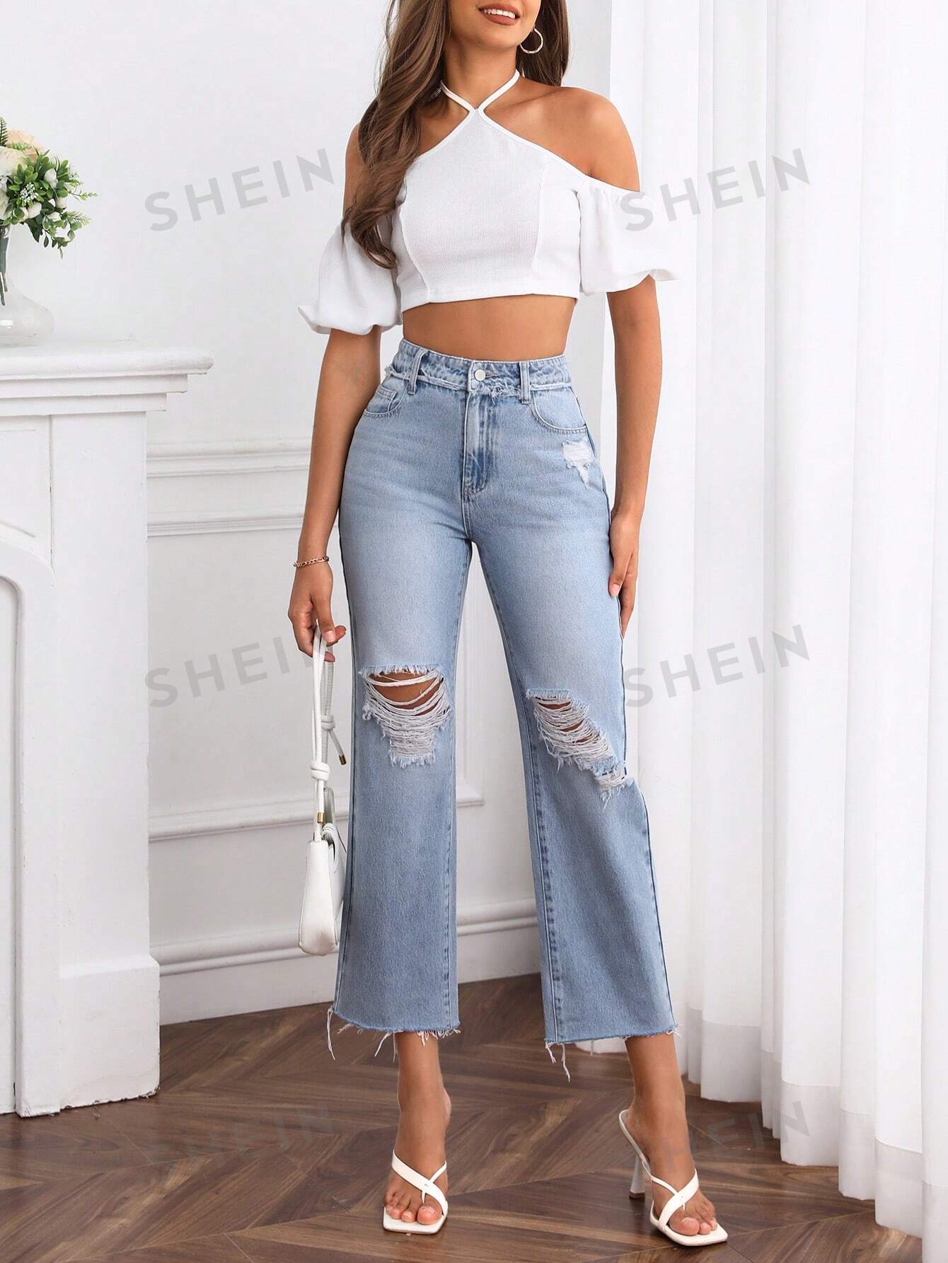 جينز بساق مستقيم حافة خام ممزق