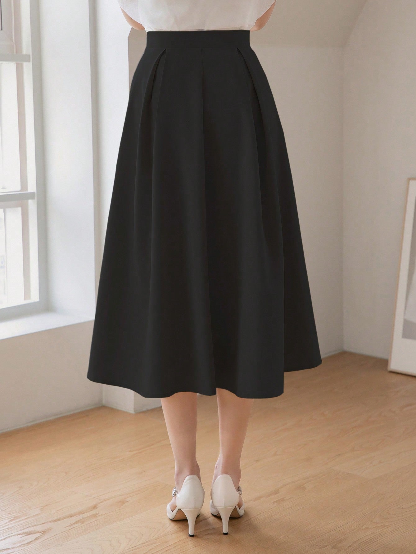 تنورة خصر عالي بتفاصيل طية التجاعيد