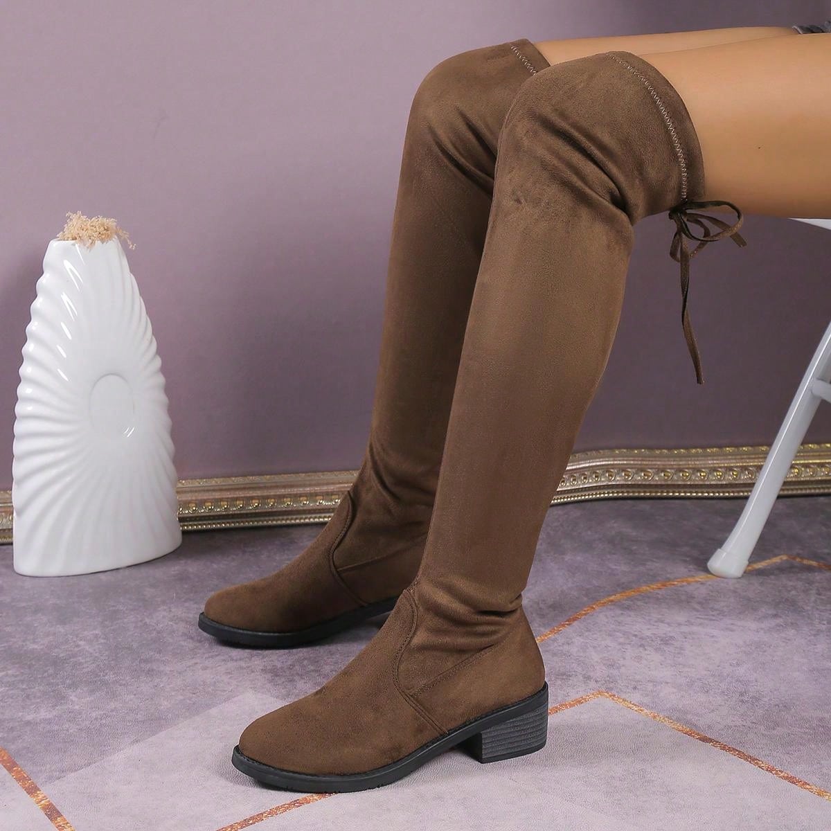 أحذية بوت نسائية فوق الركبة