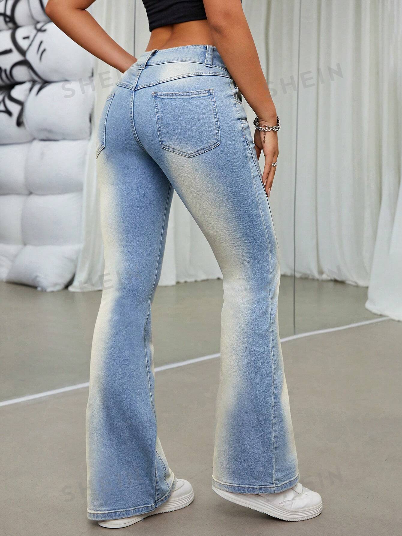 بنطلون جينز واسع من الاسفل باهت اللون