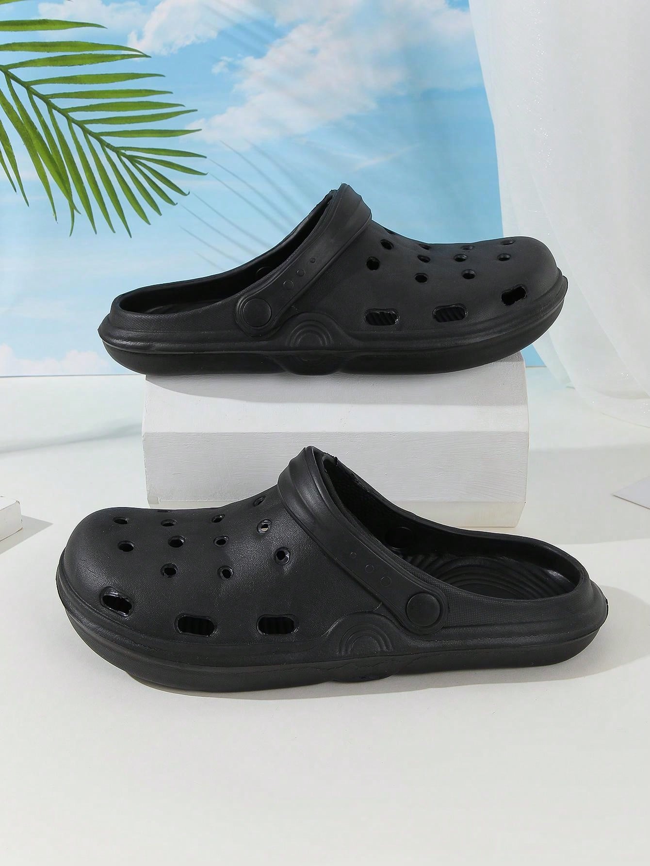 حذاء رجالي أسود بتصميم جذاب مفتوح من الأسفل