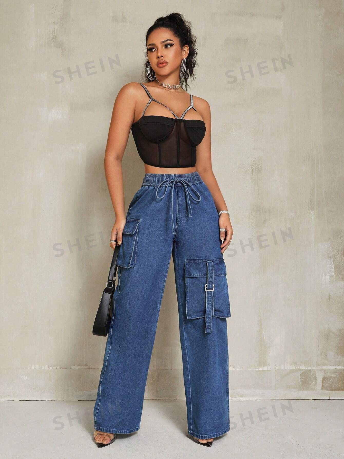 بنطلون جينز بخصر قابل للشد وجيوب للنساء