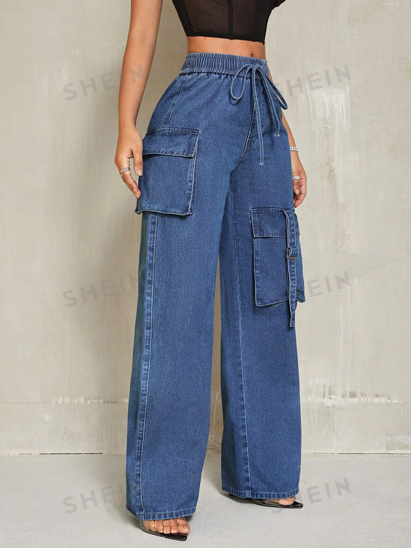 بنطلون جينز بخصر قابل للشد وجيوب للنساء