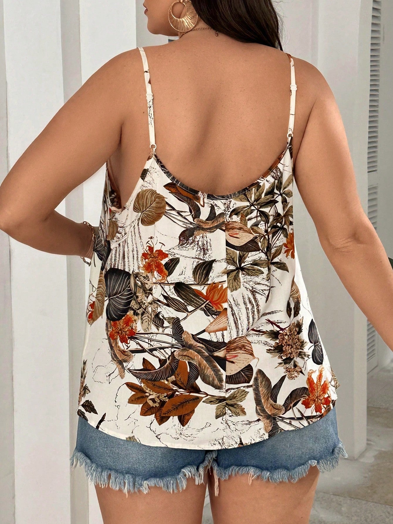 لباس علوي بدون أكمام واسع للمرأة ذات المقاس الكبير بنمط طبعات الزهور المطبوعة للمناسبات الصيفية