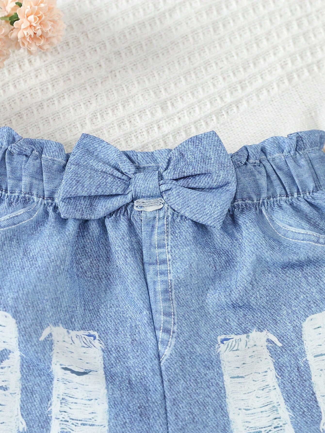 بنطلون أطفال بناتي بتقليد جينز مع زينة عقدة