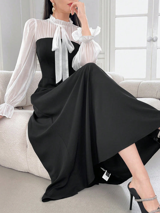 ثوب نسائي أنيق بأكمام روفل ذو خصر مطاطي