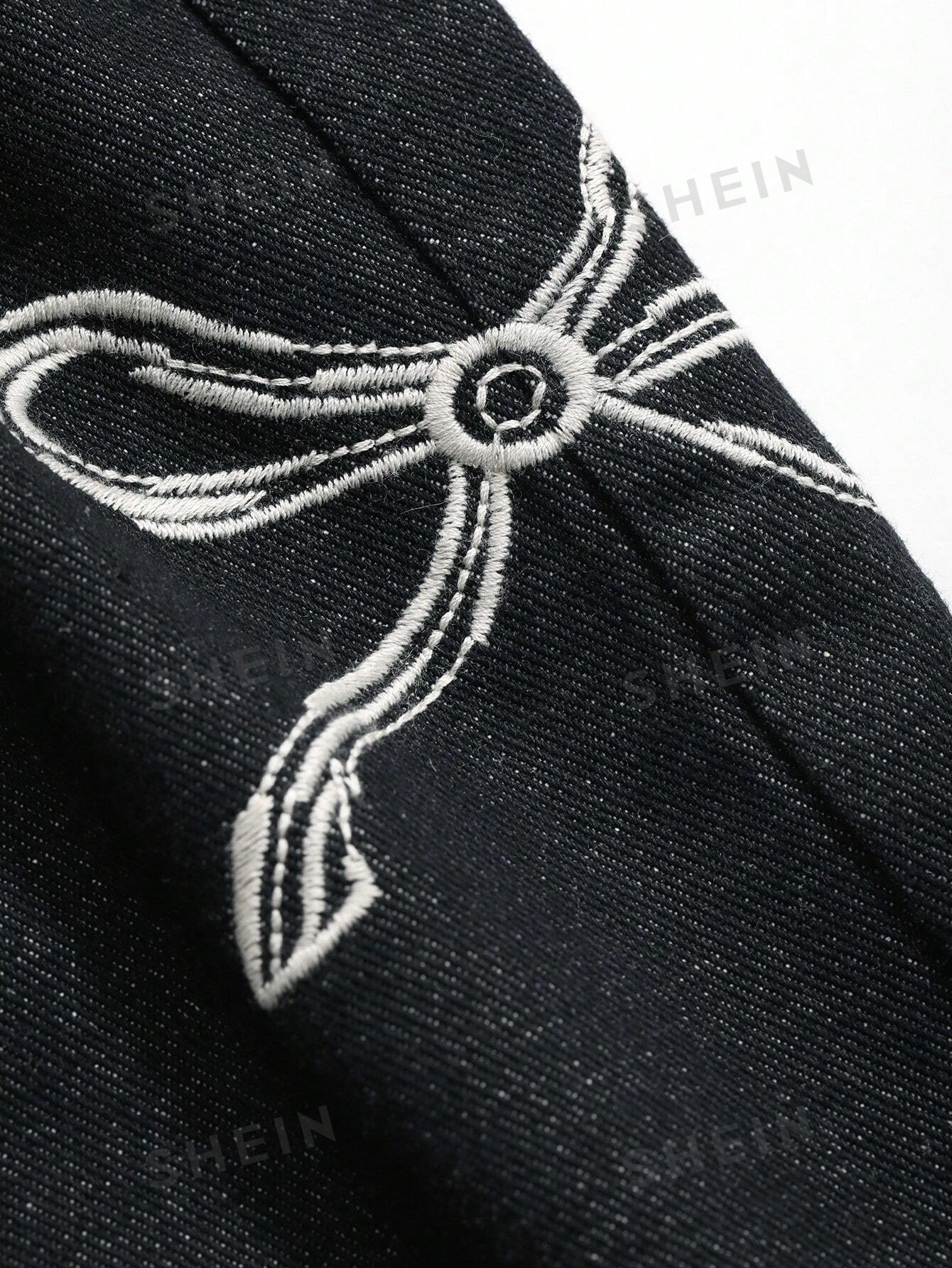 جينز واسع الساقين بطبعة القوس