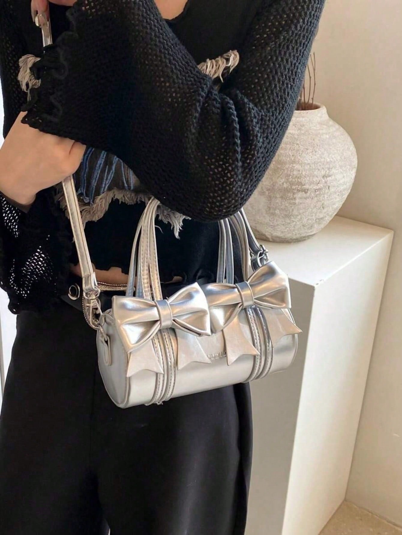 حقائب نسائية بمقبض علوي