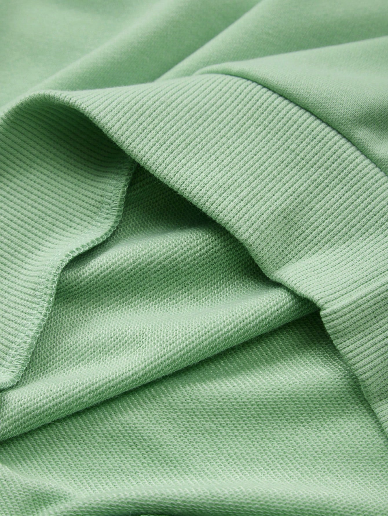 بلوزة رياضية كبيرة الحجم بياقة مستديرة وأكمام طويلة للبنات الصغيرات