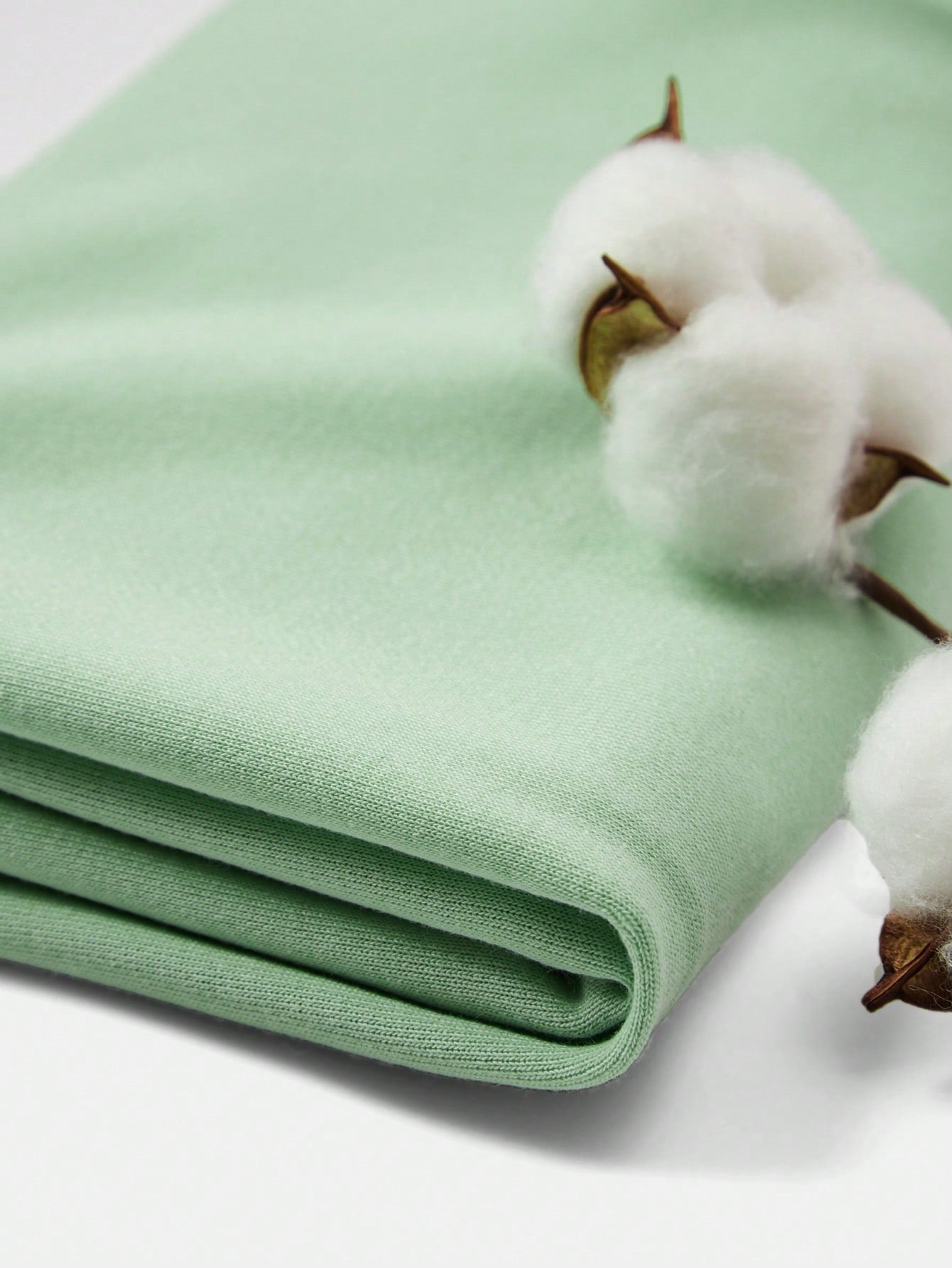 بلوزة رياضية كبيرة الحجم بياقة مستديرة وأكمام طويلة للبنات الصغيرات