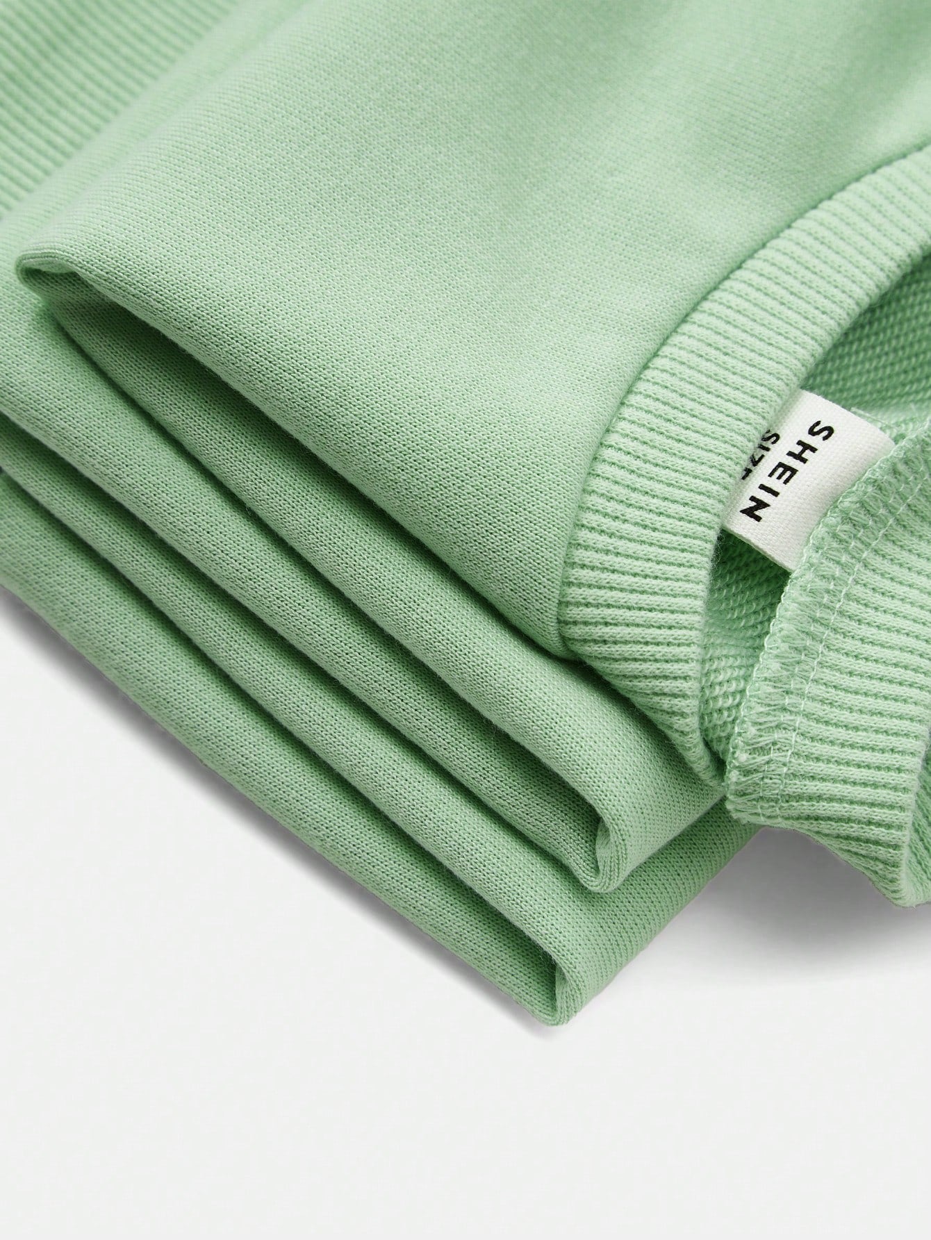 بلوزة رياضية كبيرة الحجم بياقة مستديرة وأكمام طويلة للبنات الصغيرات