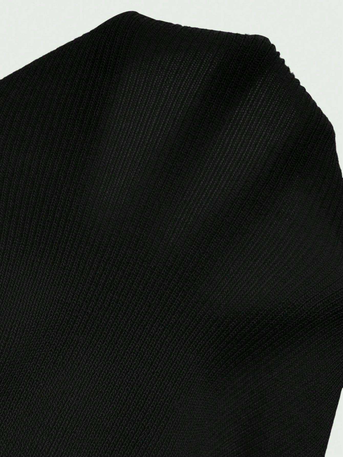 طقم من فستان محبوك بدون أكمام وسترة بأكمام طويلة بتصميم أنيق شفاف