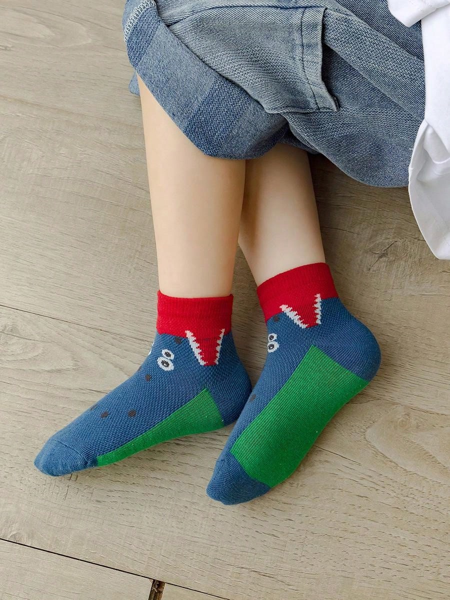 زوج واحد من الجوارب المخططة على شكل ديناصور وأسد