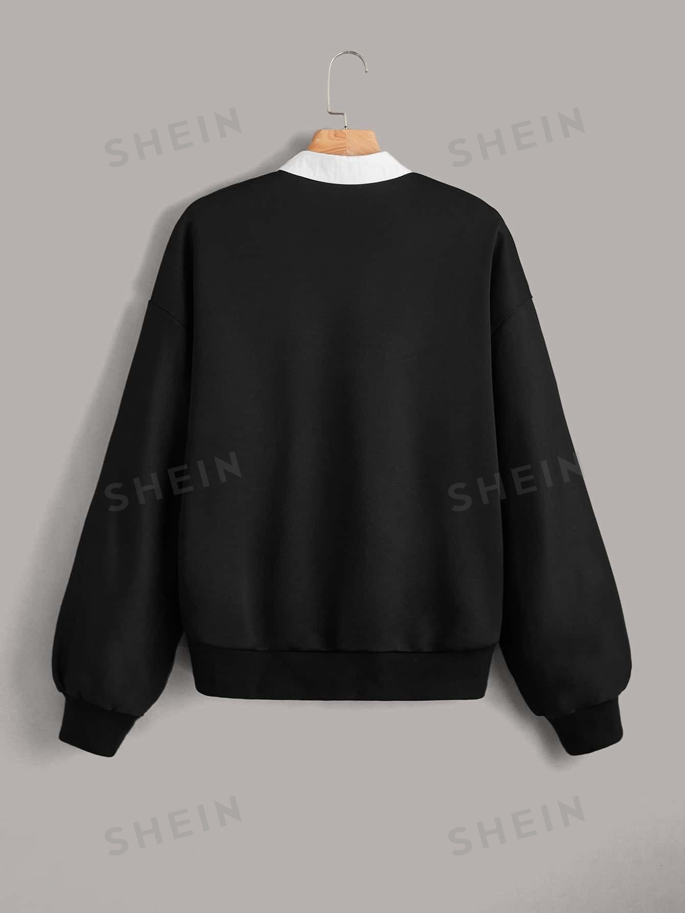 بلوفر ياقة متباينة مصحح بدب 2 في 1