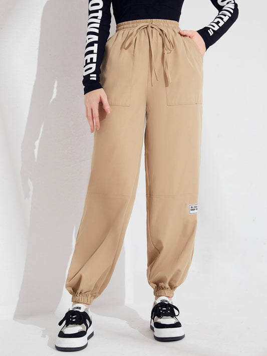 بنطلون مدرز بعبارة جيب مائل رباط