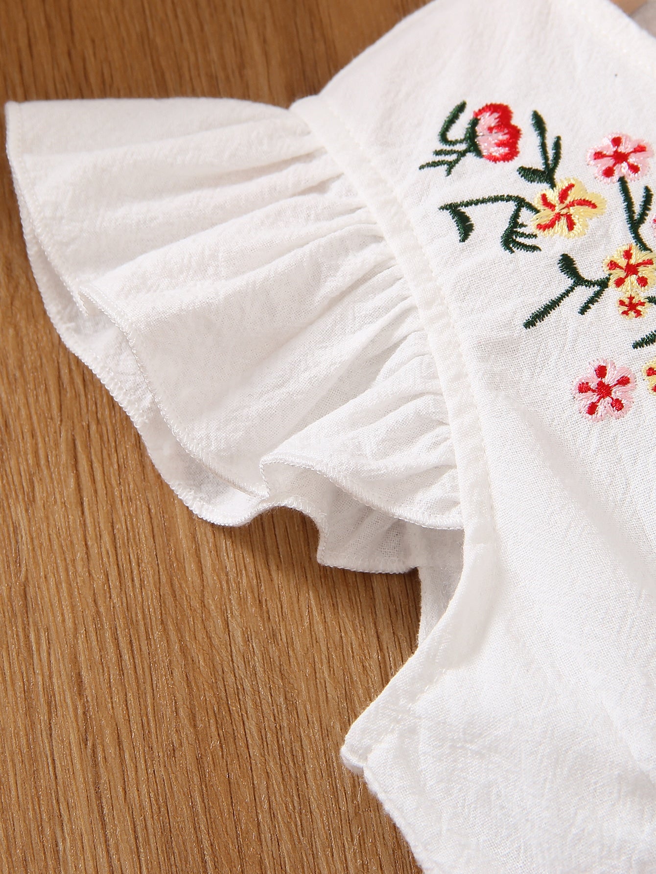 فستان مطرز بأزهار مقلم بكشكش عقدة الفراشة