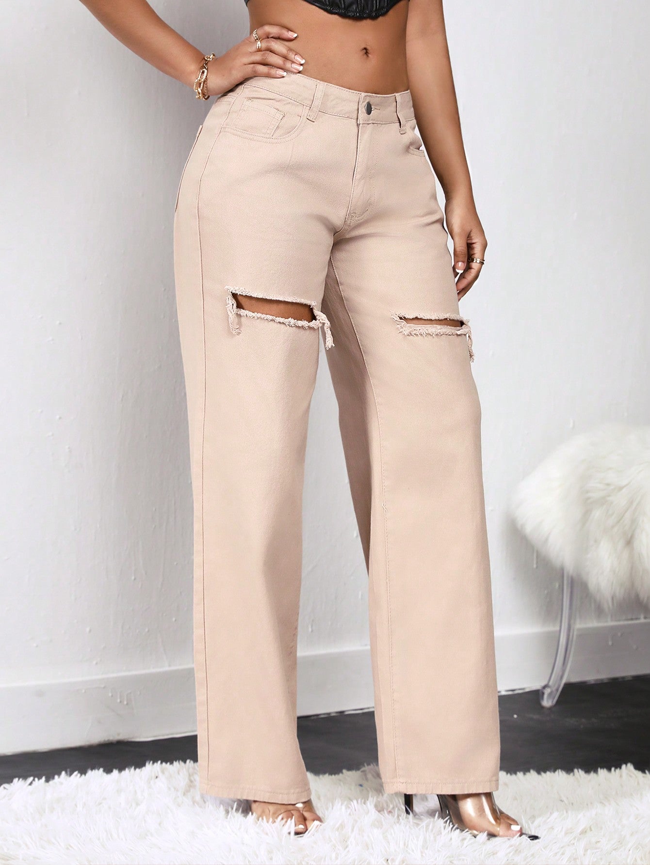 بنطلون جينز بساق عريض ممزق خصر عالي