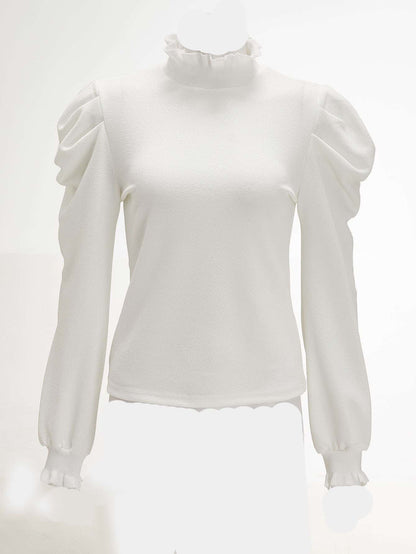 توب بخط عنق مكشكش باكمام بيشوب