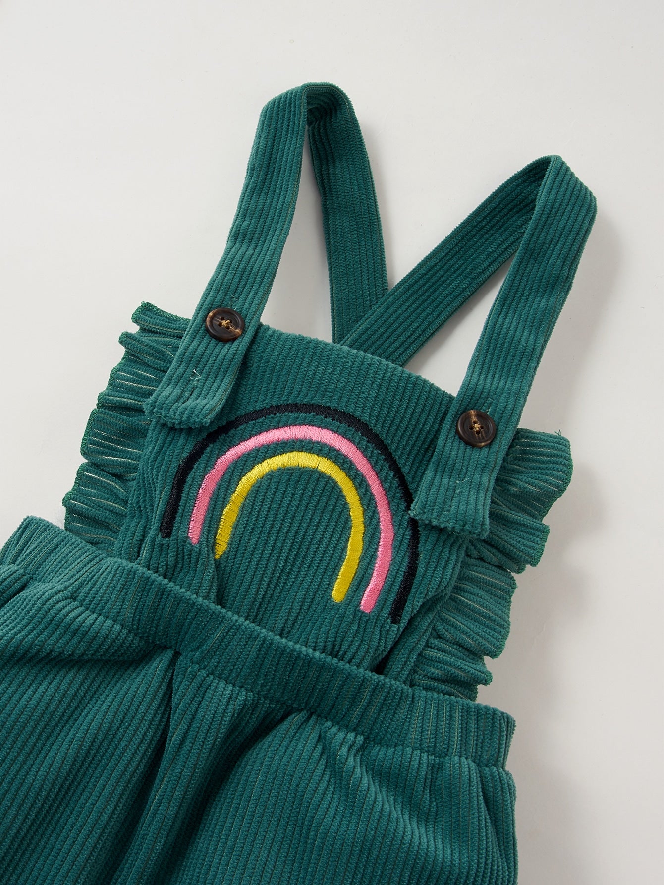 طفل بذلة التطريز