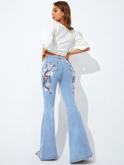 بنطلون جينز واسع من الاسفل مطرز بأزهار