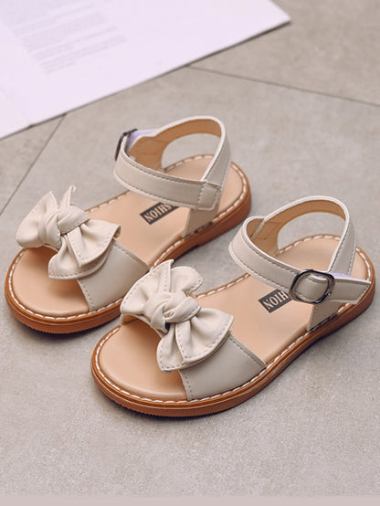 حذاء مسطح بحزام كاحل مزخرف بقوس بنات