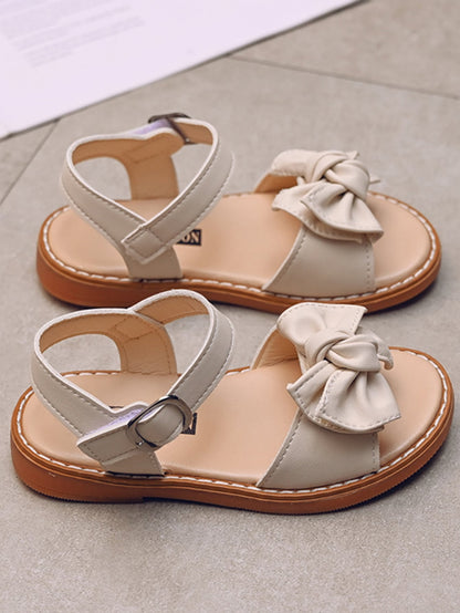 حذاء مسطح بحزام كاحل مزخرف بقوس بنات