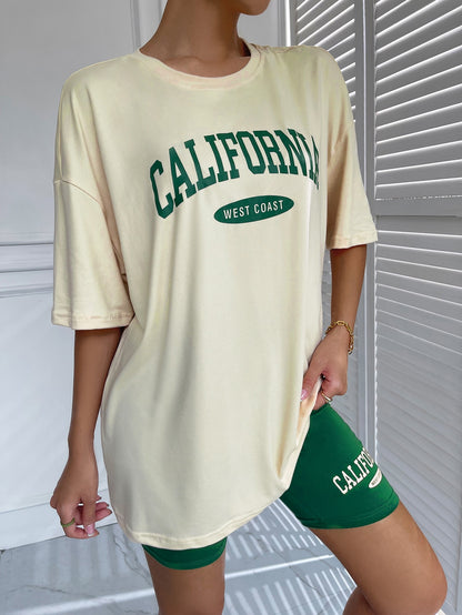 تي شيرت برسومات جرافيكية وأكتاف منسدلة وشورت لراكبي الدراجات النارية