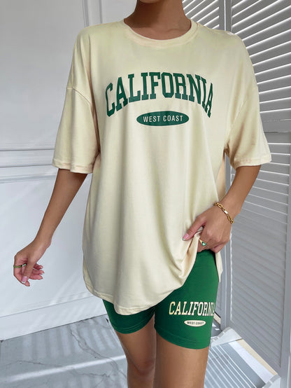 تي شيرت برسومات جرافيكية وأكتاف منسدلة وشورت لراكبي الدراجات النارية