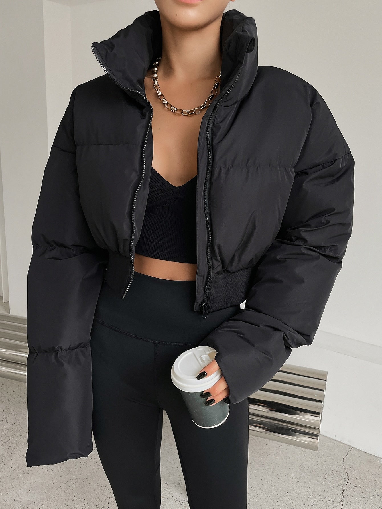 معطف سميك بأكمام منسدلة وسحاب وجيوب