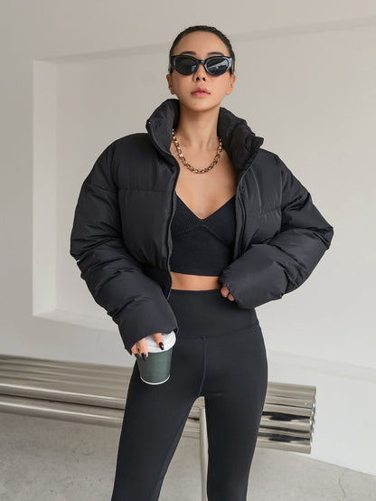 معطف سميك بأكمام منسدلة وسحاب وجيوب