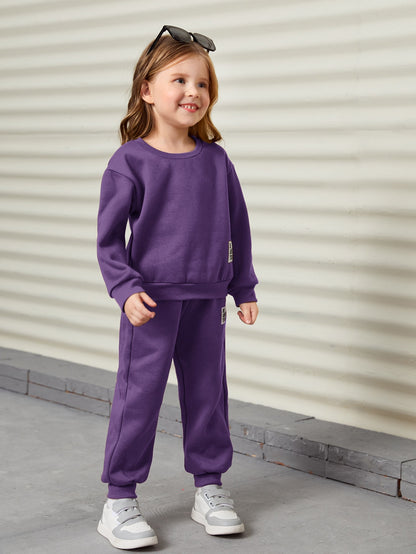 سترة تسخير وبنطلون رياضي متدلي الكتابة الخاصة بالفتاة الصغيرة