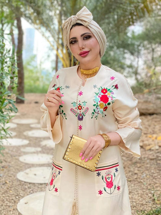 فستان طباعة الأزهار بتفاصيل مطرز جيب مزدوج بربطة عنق بشرابة