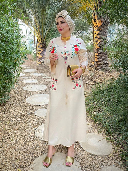 فستان طباعة الأزهار بتفاصيل مطرز جيب مزدوج بربطة عنق بشرابة