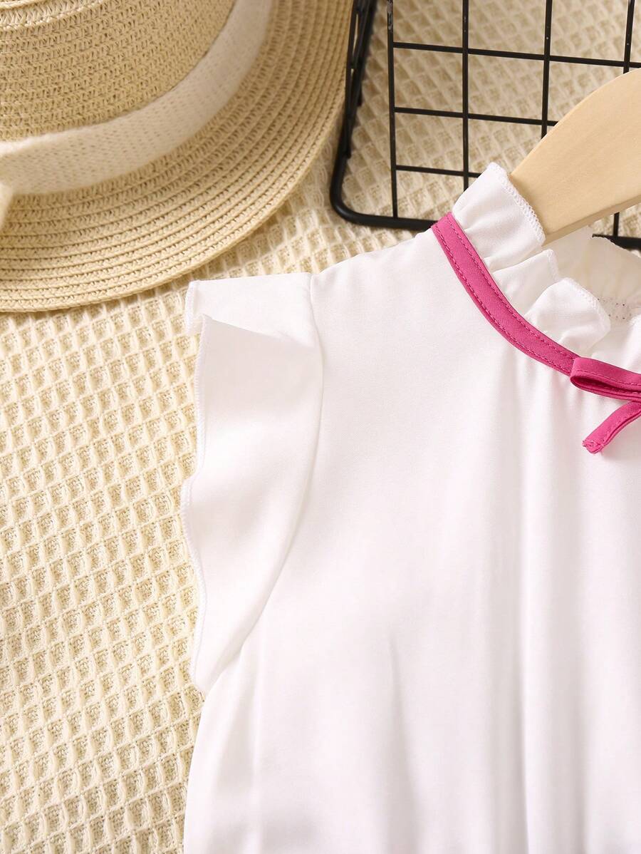 بدلة قصيرة لفتاة صغيرة بلون أزهار مع ياقة رقيقة وأكمام معكوفة للصيف