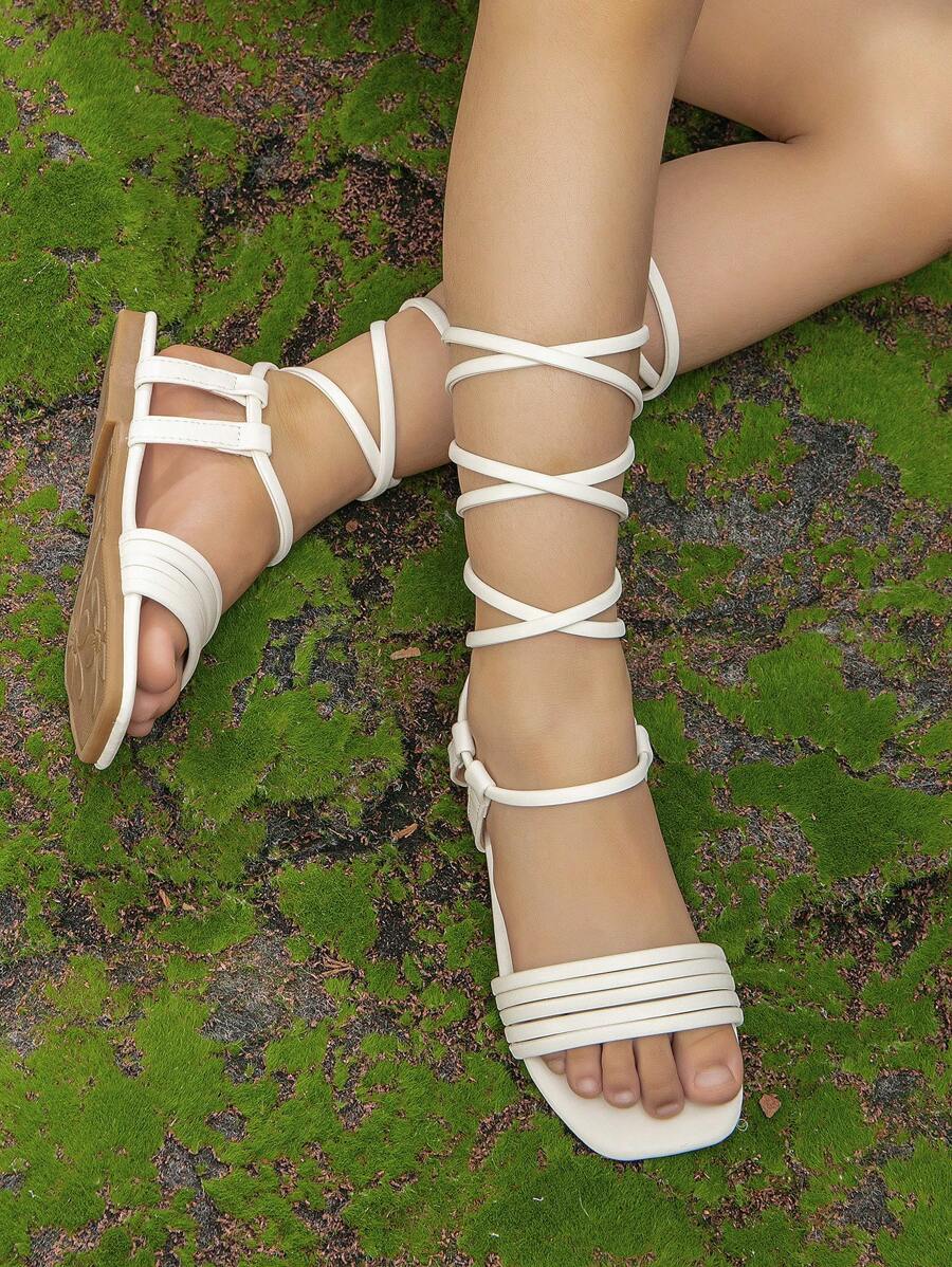 صنادل بأشرطة ربطة ساق تصميم مسطح الموضة أبيض بنات