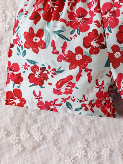 لباس علوي رقبة غير متناظرة للرضع الأنثى وشورتات زهرية مطبوعة مع حزام