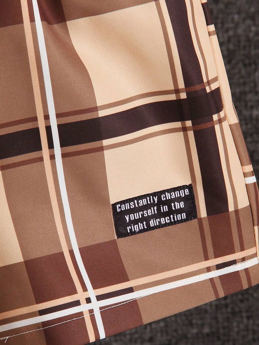 مجموعة لطفل صغير تتضمن تيشيرت مربعات مع رسالة وشورت وقبعة