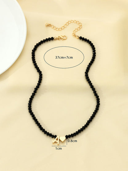 قلادة النمط البوهيمي أسود خرز حرف & بتعليقة القلب قطعة واحدة