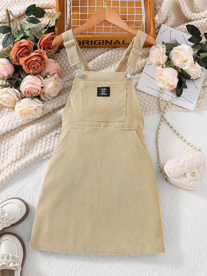 فستان افرول تفاصيل مرقع بعبارة نسيج قطن بدون تي شيرت بنت طفل