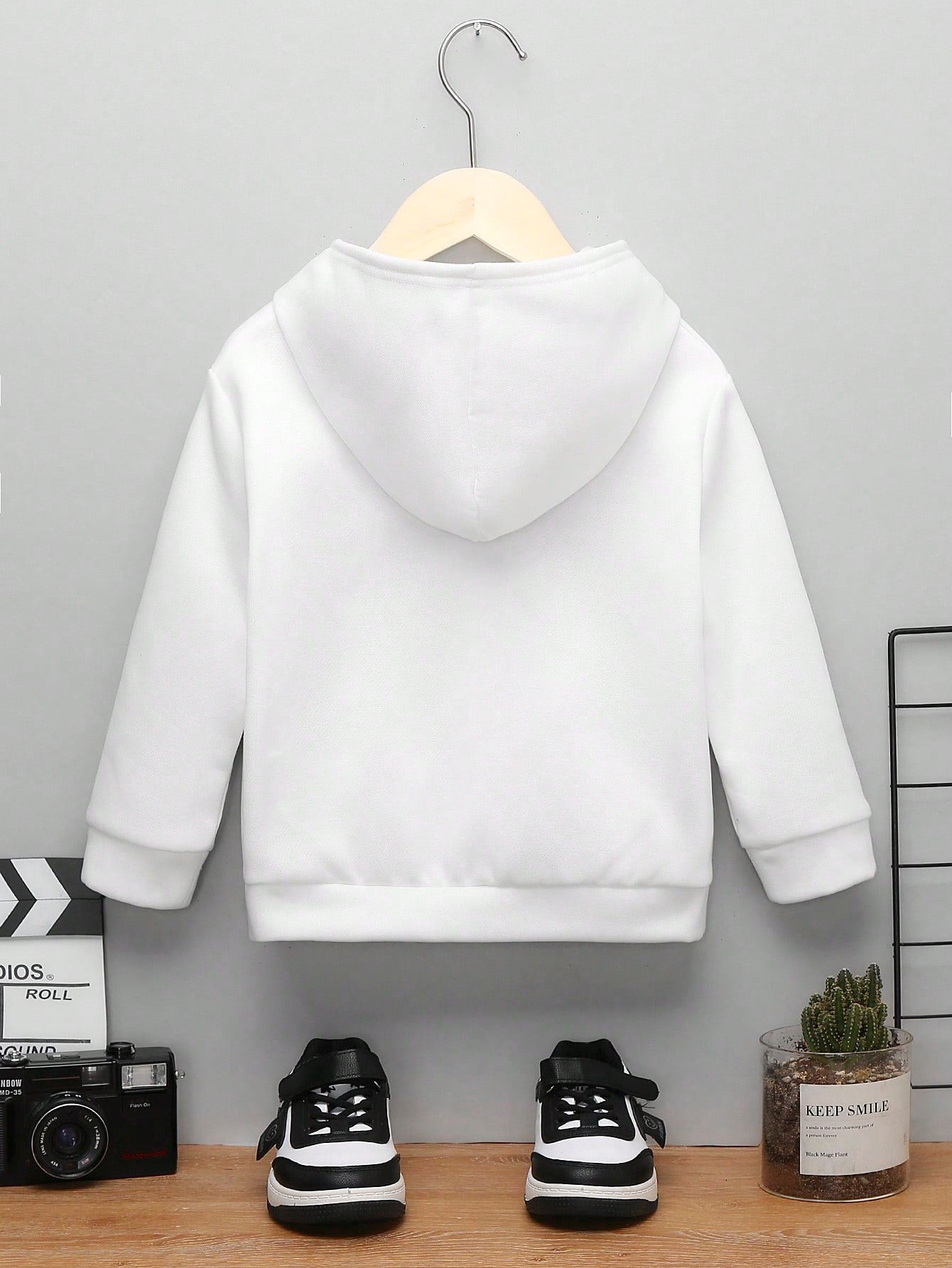 بلوزة تريكو بغطاء للرأس ذات نمط عنكبوت