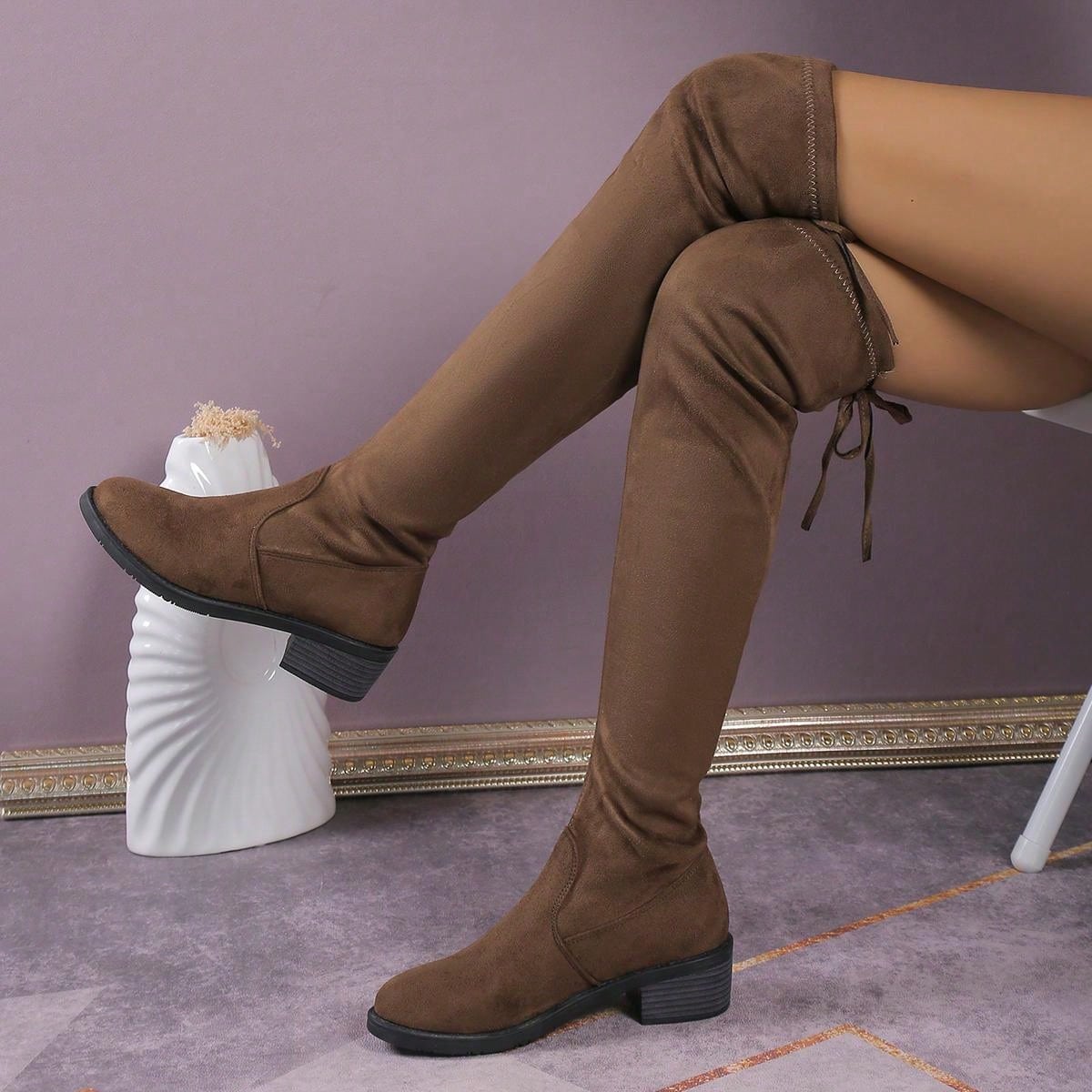 أحذية بوت نسائية فوق الركبة
