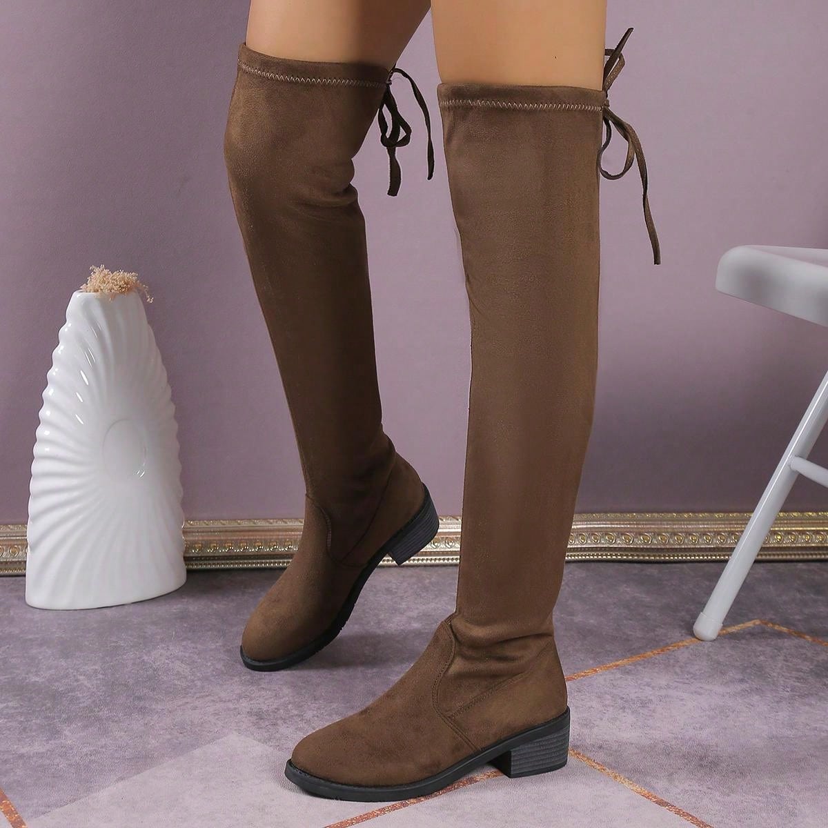 أحذية بوت نسائية فوق الركبة
